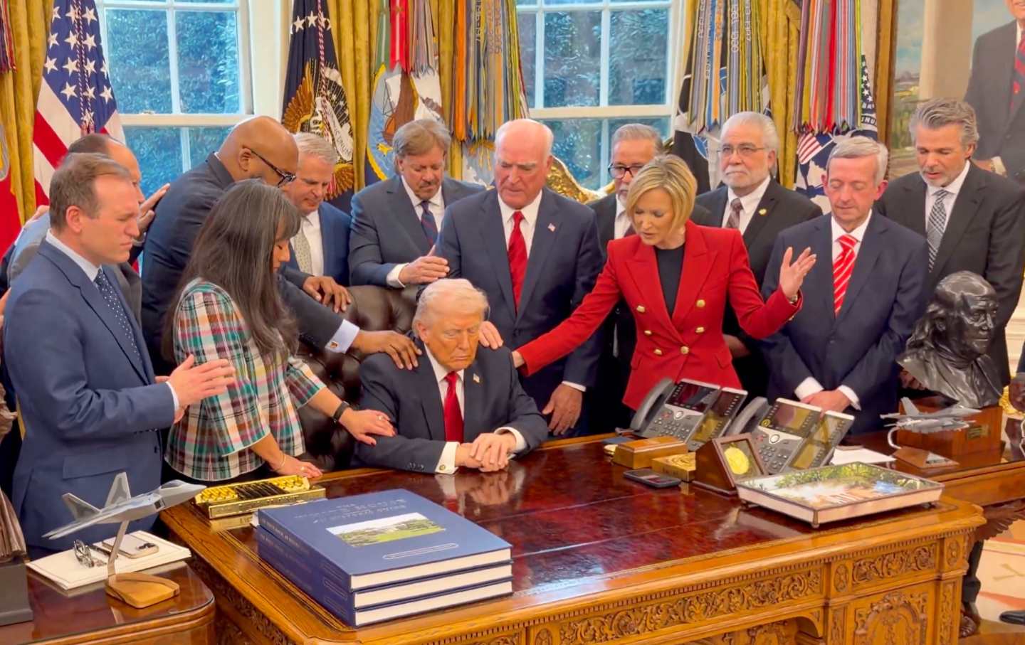 Screenshot from a White House video showing pastors praying over Donald Trump in the Oval Office on March 5, 2026.